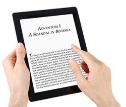 Hands holding a black-and-white tablet on which text is displayed.